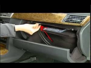 How To Locate The Auxiliary Music Plug For A Mercedes Benz 2011 E350 Convertible